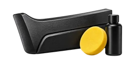 Black exterior trim with a yellow treatment applicator