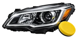 Clear vehicle headlight with a yellow polishing pad